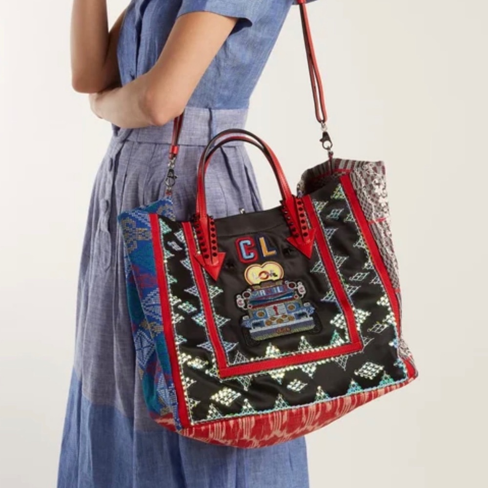 Christian Louboutin travel size bag authentic